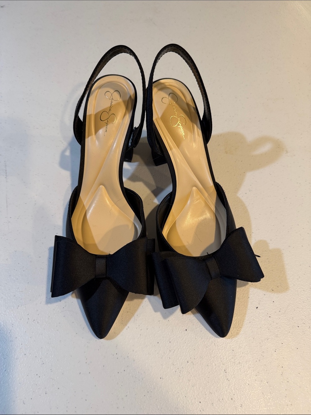 #529. Jessica sSimpson bow top heels. 8.5